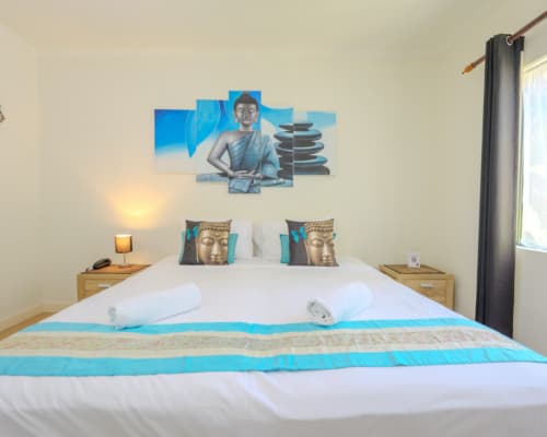 Budget hotel room with king bed at Mango Lagoon Resort, Palm Cove Cairns