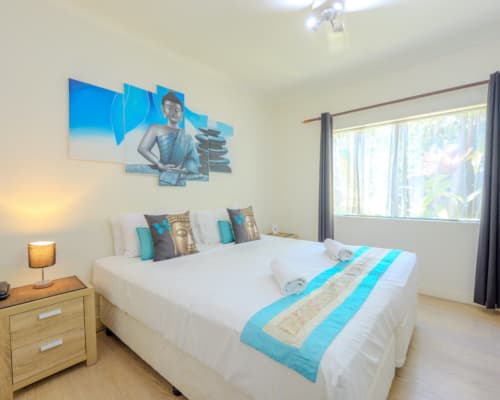 Budget hotel room with king bed at Mango Lagoon Resort, Palm Cove Cairns