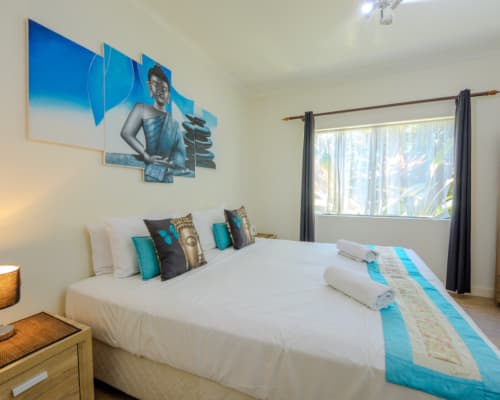 Budget hotel room with king bed at Mango Lagoon Resort, Palm Cove Cairns