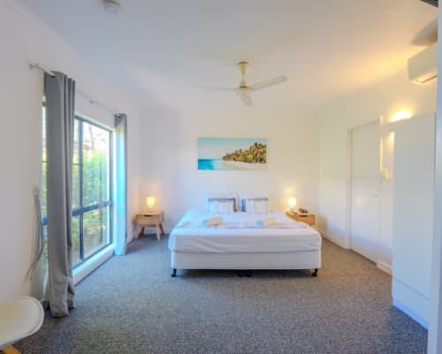 Spacious bedroom in a 1 or 2 bedroom courtyard apartment at Mango Lagoon Resort, Palm Cove Cairns