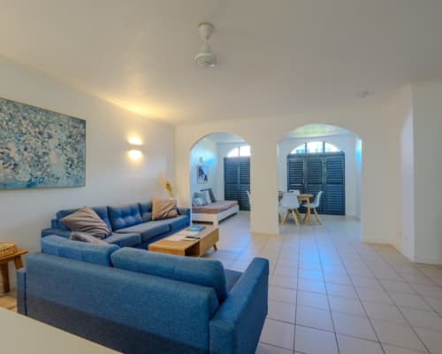 Spacious dining and lounge area of a 1 or 2 bedroom courtyard apartment at Mango Lagoon Resort, Palm Cove Cairns