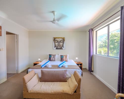 Spacious master bedroom in an upper floor 1 or 2 bedroom apartment at Mango Lagoon Resort, Palm Cove Cairns