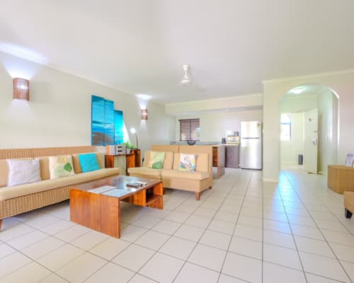 Spacious lounge and kitchen area of a 1 or 2 bedroom apartment at Mango Lagoon Resort, Palm Cove Cairns